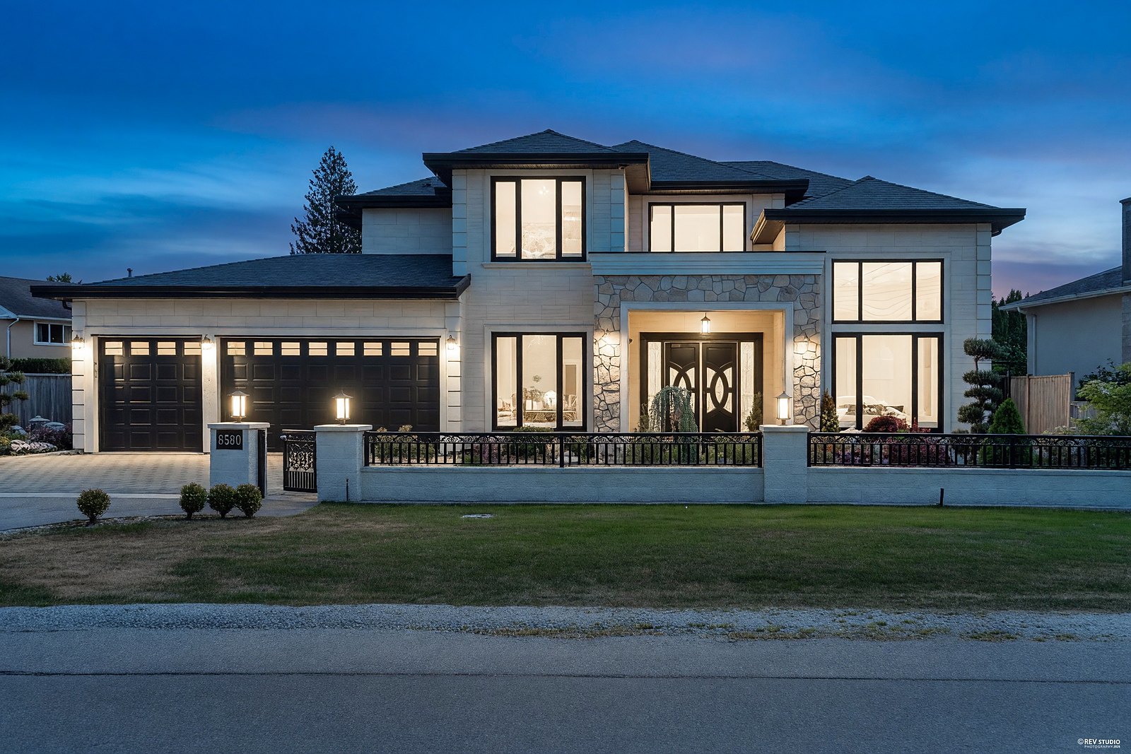 Estate home at twilight, South Surrey